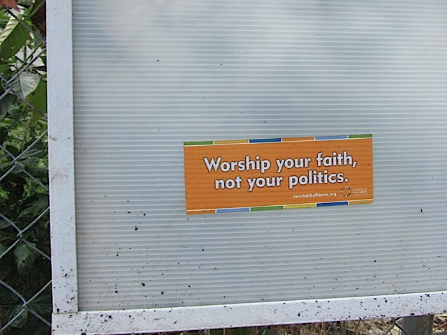 worship-sticker-on-sign