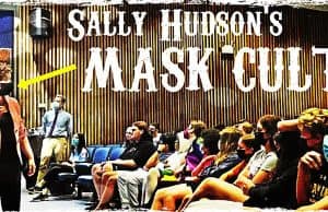 Mask cult I: Silly Sally Hudson masks-up while addressing Buford students